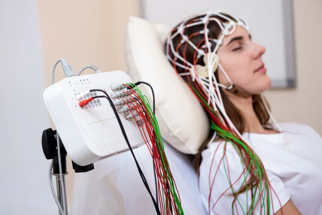 Patient having an EEG test with electrodes on the scalp